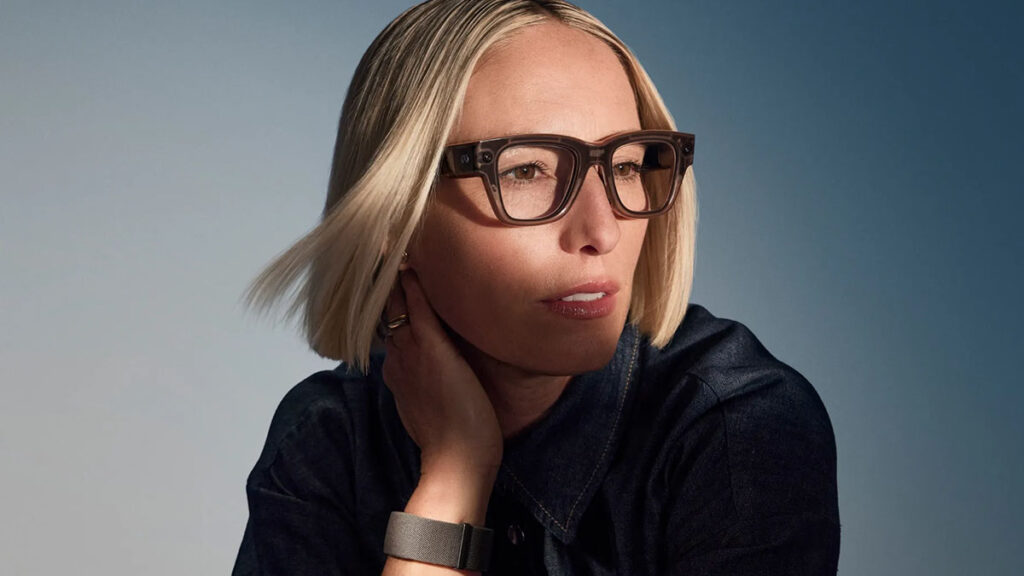 Person wearing stylish smart AR glasses and a sleek black wearable band, looking thoughtfully into the distance against a gradient background